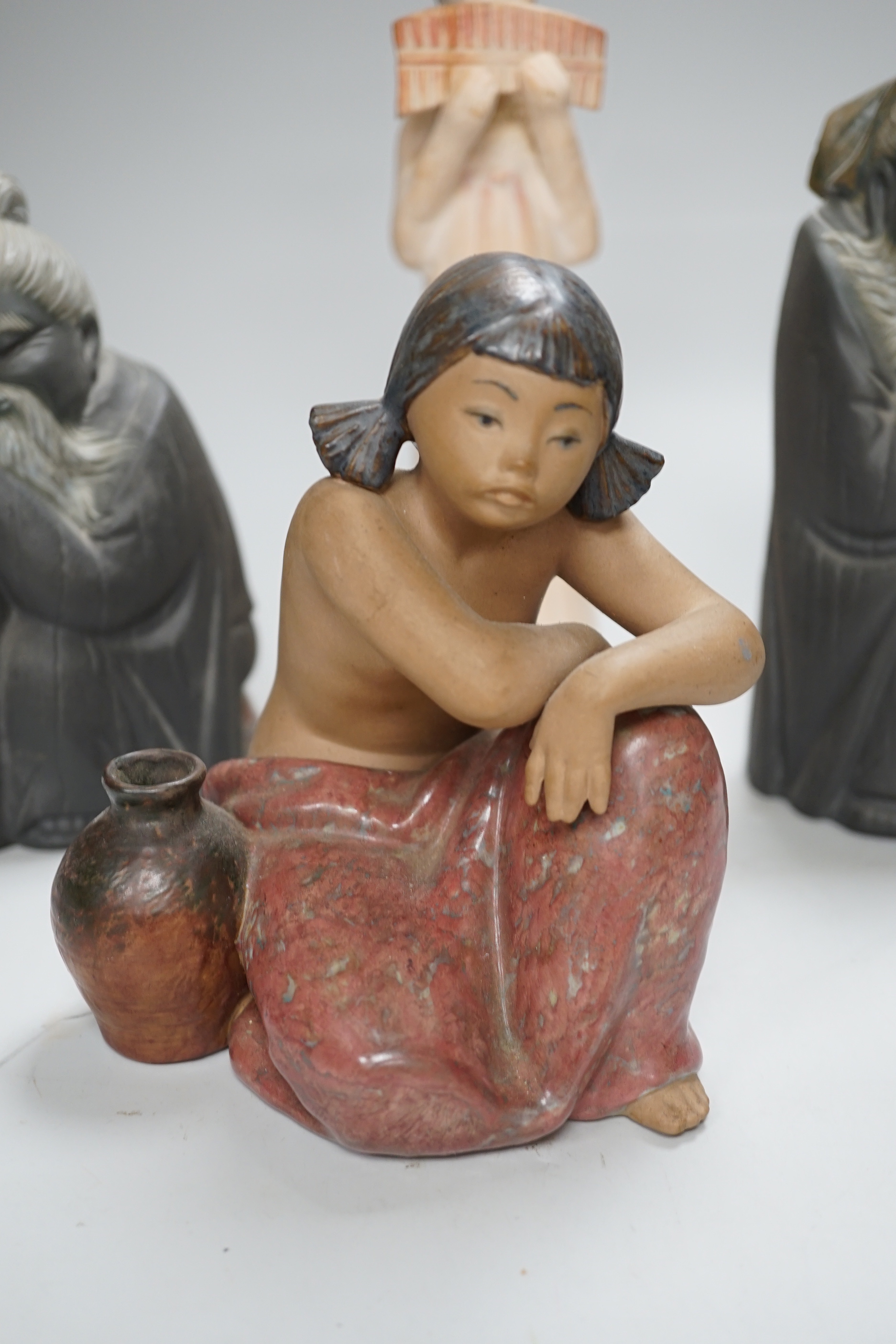 Four Lladro pottery figures